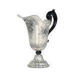 A spout in molten, embossed and chiselled silver. Italy 20th century - corpo ad elmo [...]
