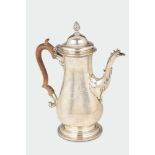 A molten silver coffee-pot, chiselled on the edge with phyteral motives, silversmith [...]