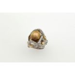Cultured pearl and diamond ring. Signed Enrico Cirio - perla centrale fresh water e [...]