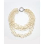 Pearls necklace with a diamond clasp/brooch. Signed Enrico Cirio - perle Bahrein e [...]
