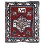 A Kazak rug, southwest Caucasus, late XIX century,cm 144x123 - campo rosso con [...]