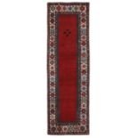 A Talish rug, Caucasus late XIX century,cm 364x112 - campo rosso unito con quattro [...]