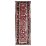 A northwest Persia runner, late XIX century, cm 357x123 - campo rosso con collari di [...]