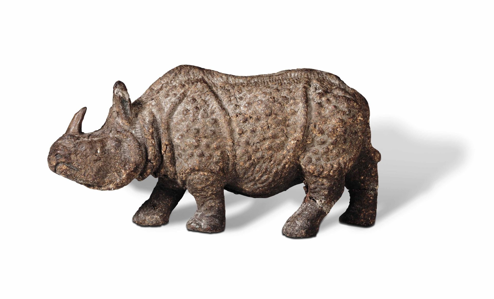 A rhinoceros, 18th-19th century - A curious sculpture, realistically moulded in [...]
