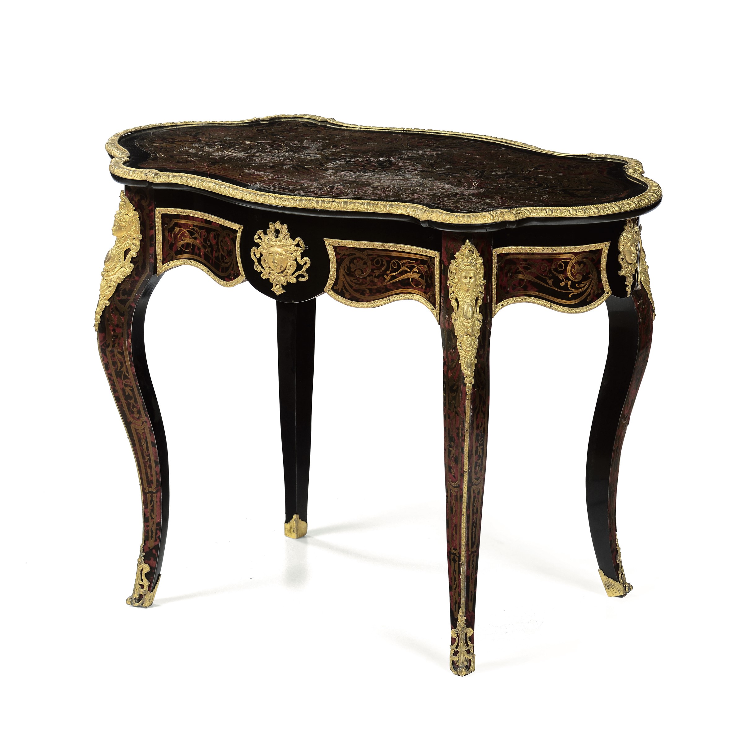 A Napoleon III table, 19th century - Ebonised wood with a gilt metal Boulle decor. [...]