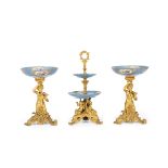 Three stands, 19th century - Porcelain and gilt bronze. H 39 and 51cm - Startprice : [...]