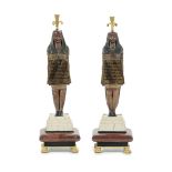 Two candleholders, 19-20th century - A pair of "Retour d'Egypt" candle holders in [...]