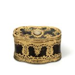 A jewel box, 18th century - An oval jewel box in tortoise, gilt copper and lava [...]