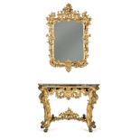 A Louis XV console table, 1800s - Carved and gilt wood console table with mirror. [...]