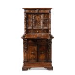 A cabinet with ancient elements - A two-part cabinet in carved wood made with [...]