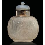 A rock crystal snuff bottle, China, 1800s - Carved with scenes of everyday life [...]