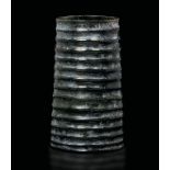 A jade vase, China, prob. Song Dynasty - An archaic cylindrical jade vase with an [...]