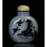 An agate snuff bottle, China, 20th century - Cameo decor depicting a wiseman sitting [...]