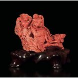 A carved coral group depicting monkeys and a wolf, China, early 20th century - gr [...]