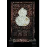 A table screen, China, 20th century - A small table screen with a double plaquette in [...]