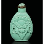 A turquoise snuff bottle embossed with monkey's heads, China, Qing Dynasty, 19th [...]