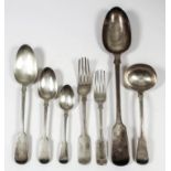 A harlequin Victorian silver fiddle pattern part table service, comprising - eleven tablespoons,