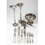 A set of six late Victorian silver and mother-of-pearl handled fish knives and forks, the blades