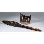 A mid-20th Century Kambata hardwood headrest with three flat incised support columns, 7ins wide x