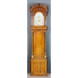 An early 19th Century ornate oak longcase clock by Thomas Ross of Crowle, dated 1801, the 12ins