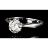 A modern 18ct white gold mounted diamond solitaire, the brilliant cut stone of approximately .