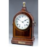 An early 20th Century mahogany cased mantel clock of "George III" design, with 5.25ins diameter