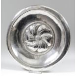 A Peruvian sterling silver circular plate, the centre embossed with flowerhead within rope pattern