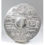 An Indian silver circular "78 Gramaphone Record" case, the cover chased and embossed with figures