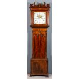 An early 19th Century mahogany longcase clock by John Alker of Wigan, the 14ins square painted