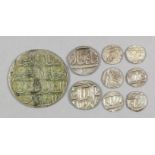 Nine Near Eastern silvery metal hammered coins (in three various sizes), a small selection of