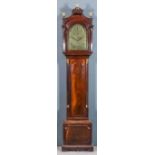 A late 18th Century mahogany longcase clock by Thomas Oldmeadow of Lynn, the 12ins arched brass dial