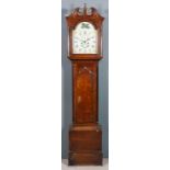 A 19th Century oak longcase clock by Broderick of Spalding, the 12ins arched painted dial with Roman