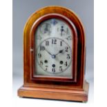 An early 20th Century German mahogany mantel clock, No. 5032, the silvered dial with Arabic numerals