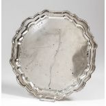 A George V silver circular waiter of shaped and moulded outline, 8ins diameter, by Hamilton & Co Ltd