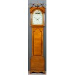 A 19th Century oak longcase clock by Thomas Dickinson of Boston, the 12ins arched painted dial