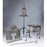 An 18th/19th Century wrought iron adjustable toasting stand on high tripod base, 33.75ins high, a
