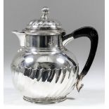 A late Victorian silver hot water pot with domed cover, with reeded knop finial, moulded edge, the