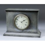 A Liberty & Co "Tudric" pewter cased mantel timepiece, No. 01212, the 3.25ins white dial with