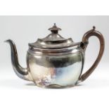 A George III plain silver oval teapot with moulded oval lid and fruitwood handle and finial, 6.