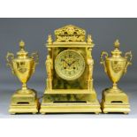 A late 19th/early 20th Century French gilt brass three piece clock garniture, the clock with 3.75ins