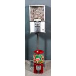 A modern Northern Beaver "Pound-in-the-slot" pedestal vending machine of "1950s" design, the