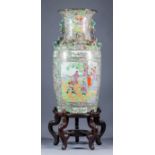A Chinese Cantonese porcelain two-handled vase enamelled in colours and gilt with figures on