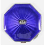 A George VI lady's silver and blue enamel octagonal compact, the guilloche enamel to lid decorated