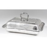 A George V silver rectangular entree dish and cover with reeded and ribbon pattern mounts to rims,