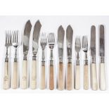 Ten Edward VII silver and ivory handled fish forks and four matching knives by The Goldsmith &