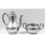 A Victorian silver baluster-shaped coffee pot with berry and leaf pattern handle, the whole engraved