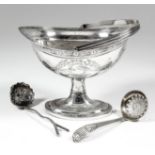 A George III Irish silver oval sugar basket with moulded bale handle and rim, engraved with band