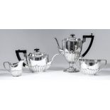 A George V silver four piece tea and coffee service of "Georgian" design, the oval bodies partly