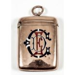An Edward VII 9ct gold and enamel rectangular vesta case, the front enamelled with monogram, 2ins