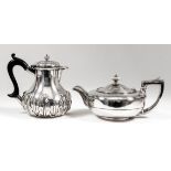 A George IV silver circular teapot of bulbous squat form, with ivory finial, and angular loop